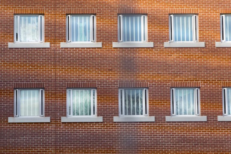 The newly refurbished cell windows of C wing. HMP YOI Winchester was built in 1846 and is typical of the Victorian prison, radial design. It is currently a Category B Local prison that serves the local courts, has an operational capacity of 690 and is able to take men from the age of 18 upwards. HMP Winchester, Hampshire, United Kingdom. (All image use MUST be credited © prisonimage.org)